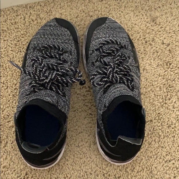 black and grey KD 11 flying basketball shoe (kids) - Picture 1 of 2